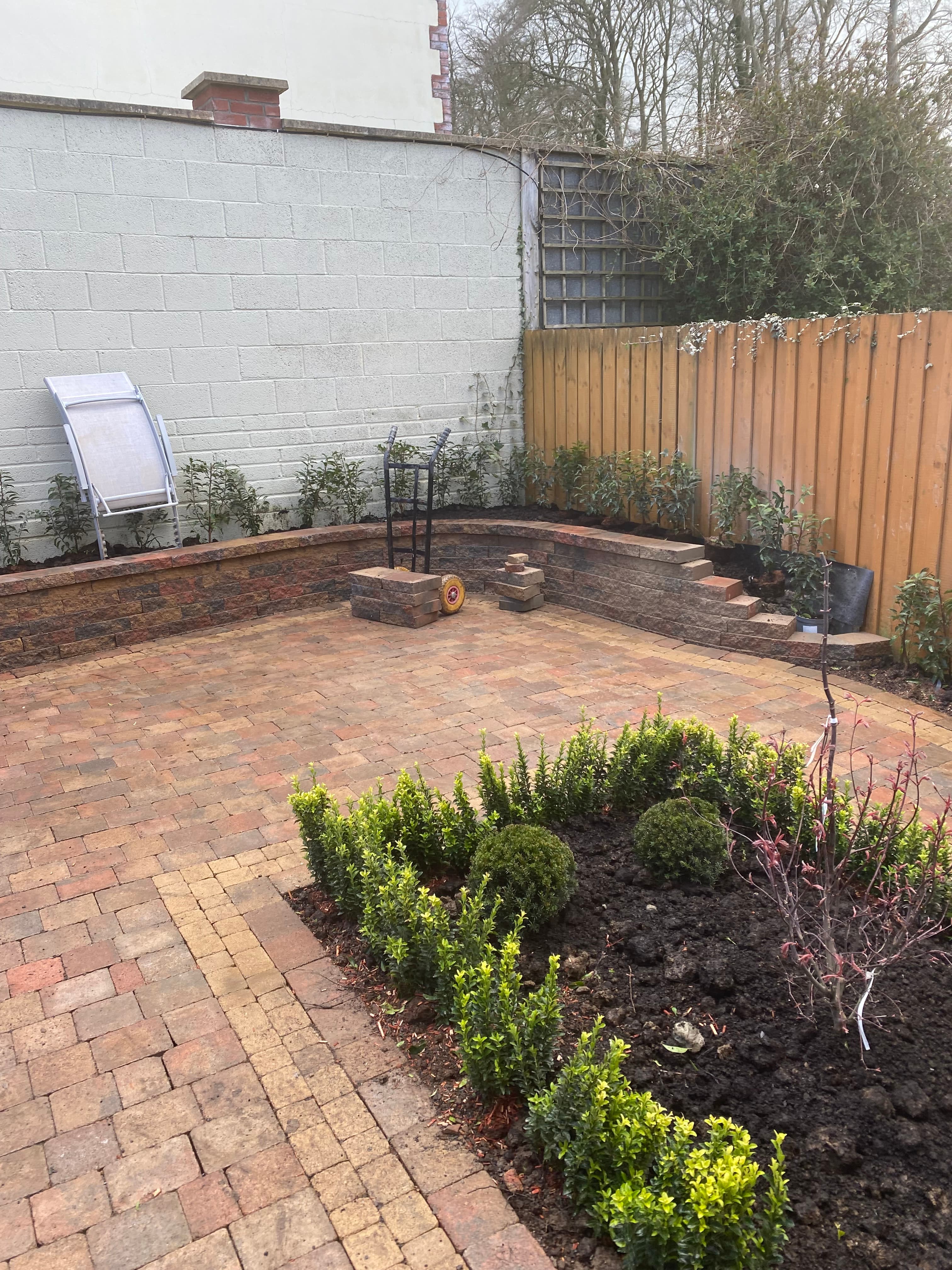 Patio paving with shrub beds in Johnstown, Meath