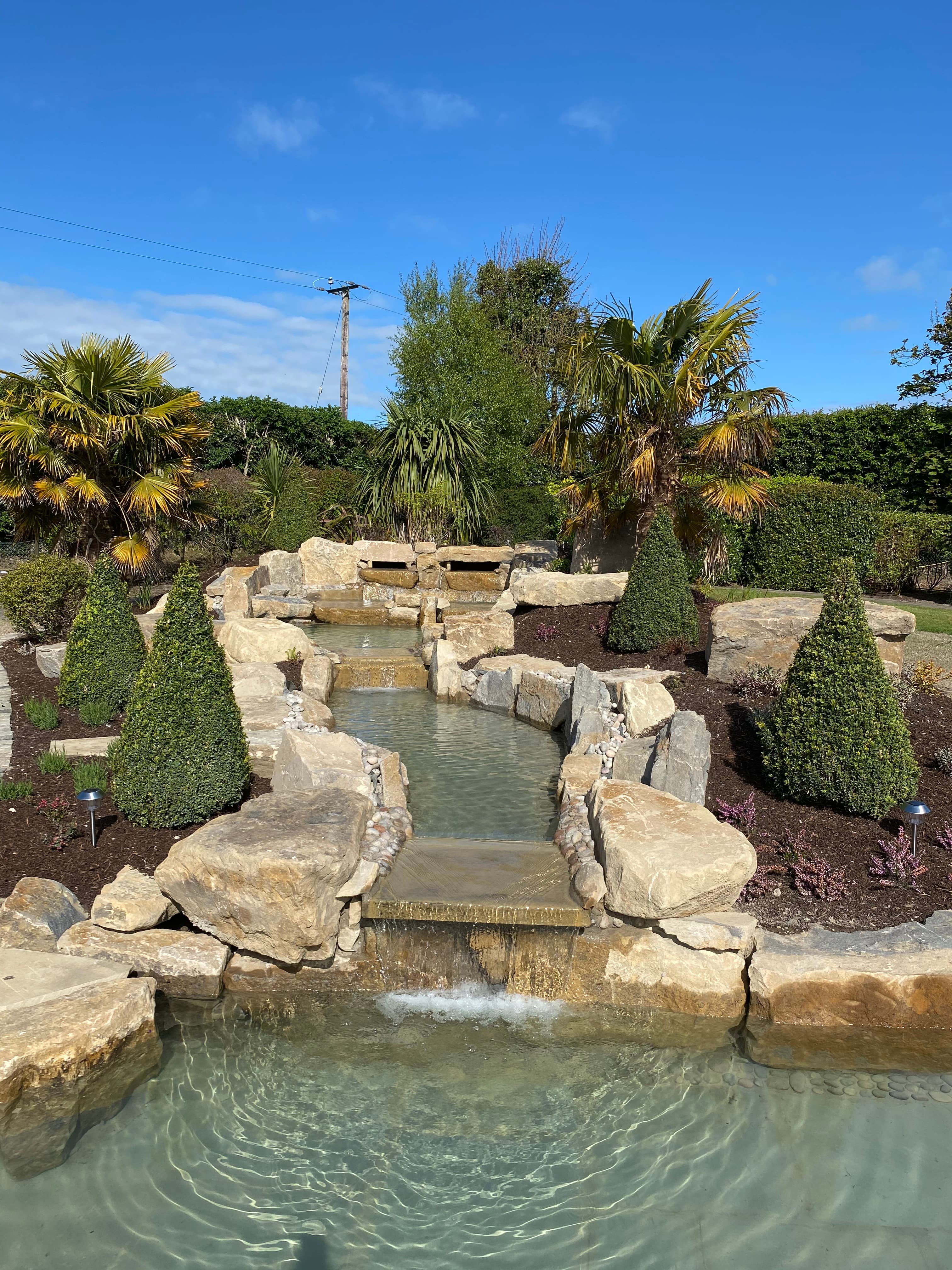 Patio beside waterfall feature in Castletown, Meath